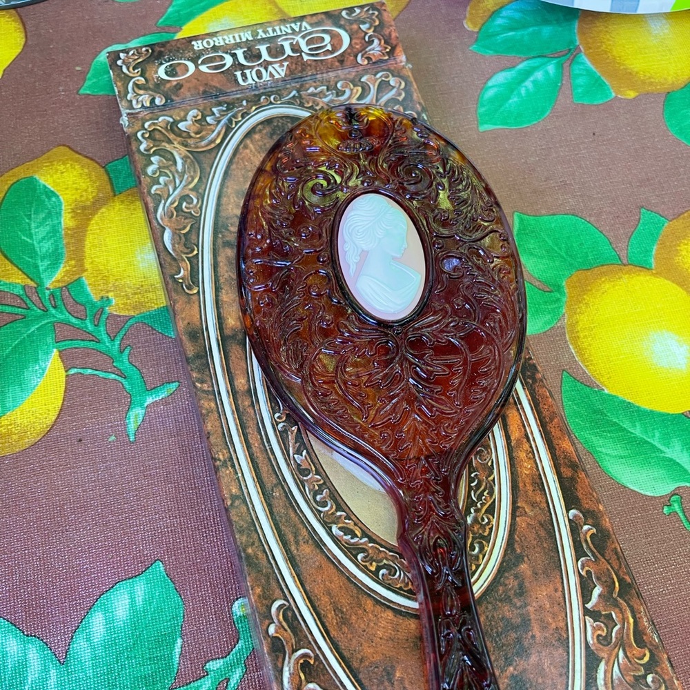 Vintage Avon handheld mirror